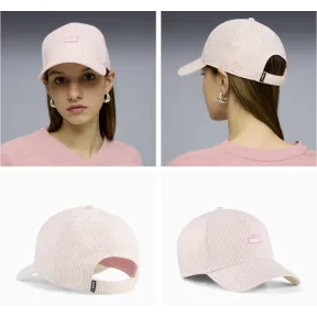 Gorra Essentials con logo n.º 1 en gris o rosa.