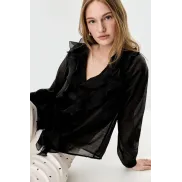 Semitransparente camisa con volantes