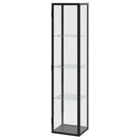 Vitrina negra y blanca con iluminación integrada