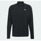 Camiseta essentials tech con cremallera hasta el pecho trébol