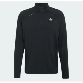 Camiseta essentials tech con cremallera hasta el pecho trébol