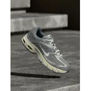 Nike Air Max Moto 2K en gris claro y blanco, tallas 35.5-46