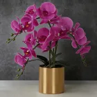 Orquídea artificial decorativa con jarrón