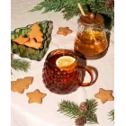 Taza de vidrio con piñas en relieve