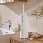 Irrigador dental e bucal para una limpieza profunda