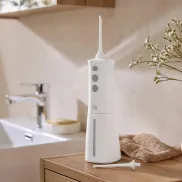 Irrigador dental e bucal para una limpieza profunda
