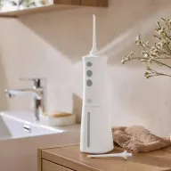 Irrigador dental e bucal para una limpieza profunda