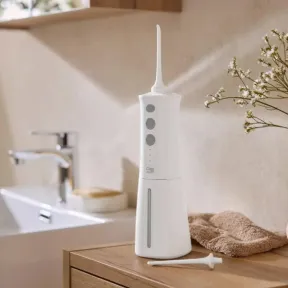 Irrigador dental e bucal para una limpieza profunda
