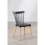 Silla negra ALCIONE con asiento de polipropileno y patas de haya