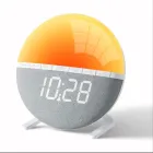 Reloj de mesa con luz solar y sonido natural.
