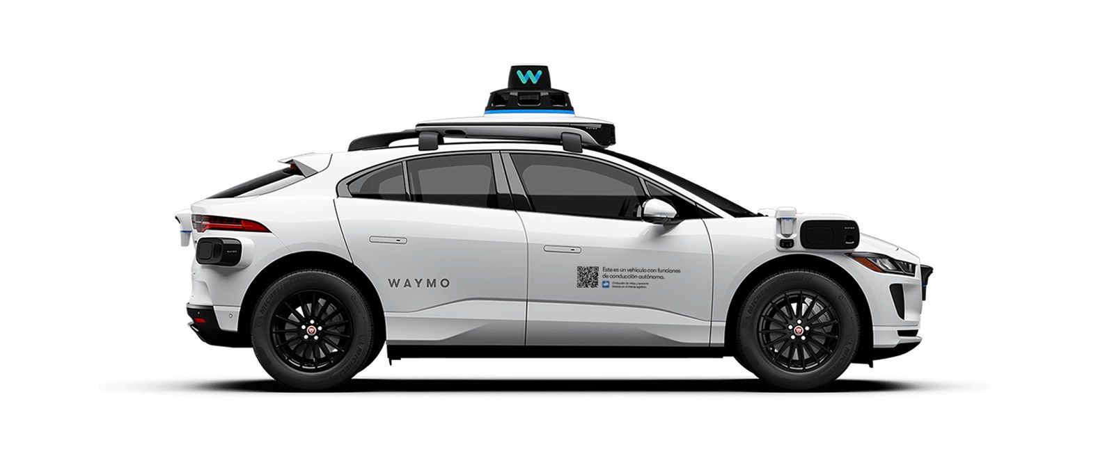 Jaguar I-PACE blanco de Waymo con los sensores en el techo, visto de lado