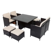 Comedor de jardín 9 piezas con mesa de cristal.
